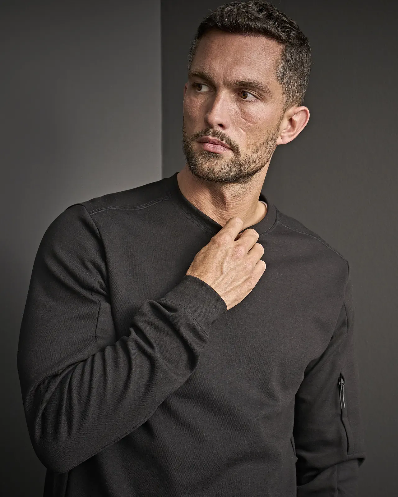 tee-jays-5700-athletic-crew-neck-sweatshirt-black-model-0 Tee Jays Athletic Crew Neck Sweat