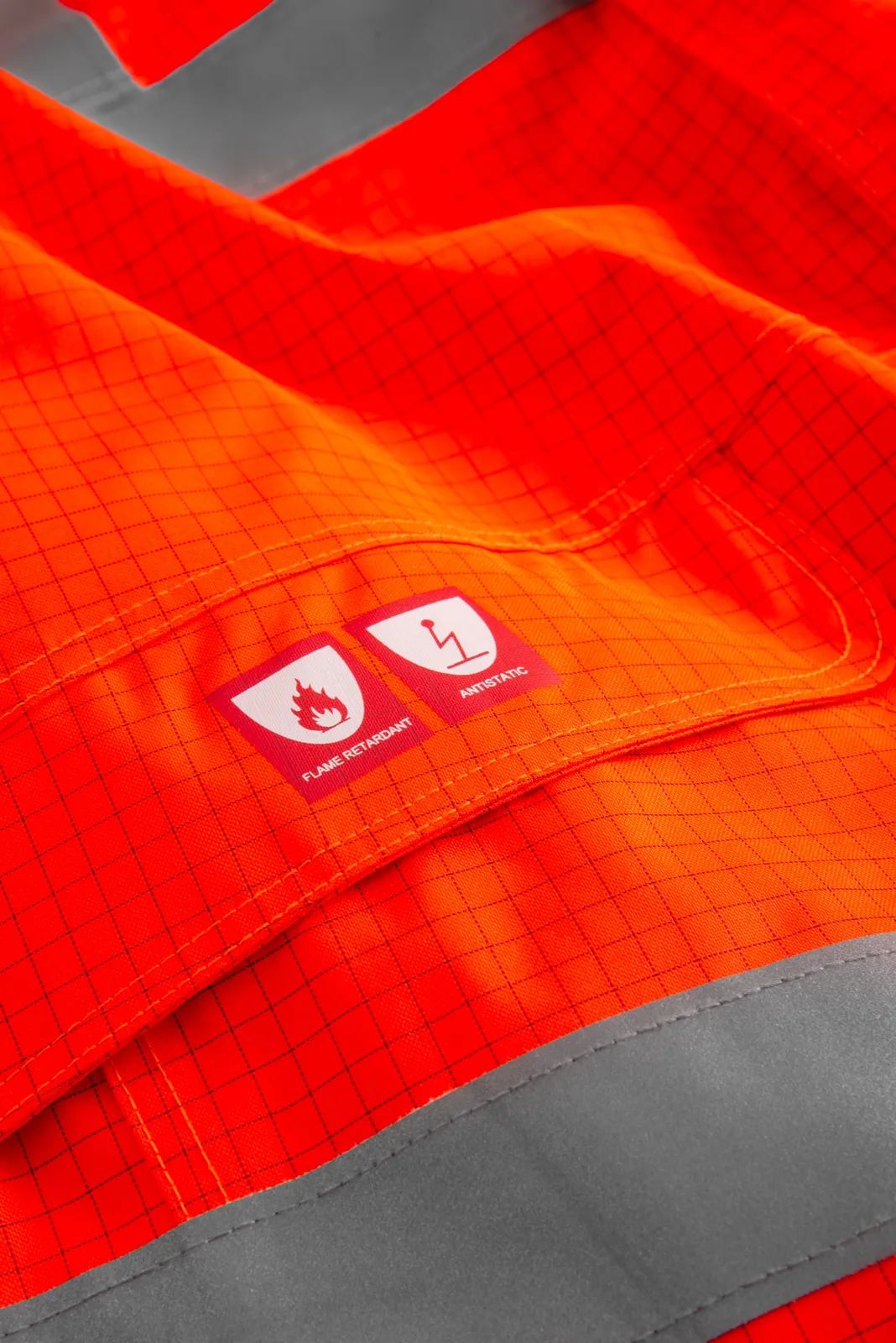 lyngsoe-fr-lr1148-flammhemmende-hi-vis-winter-jacke-leuchtrot-detail-6 Lyngsøe FR-LR1148 Flammhemmende Hi-Vis Winterjacke