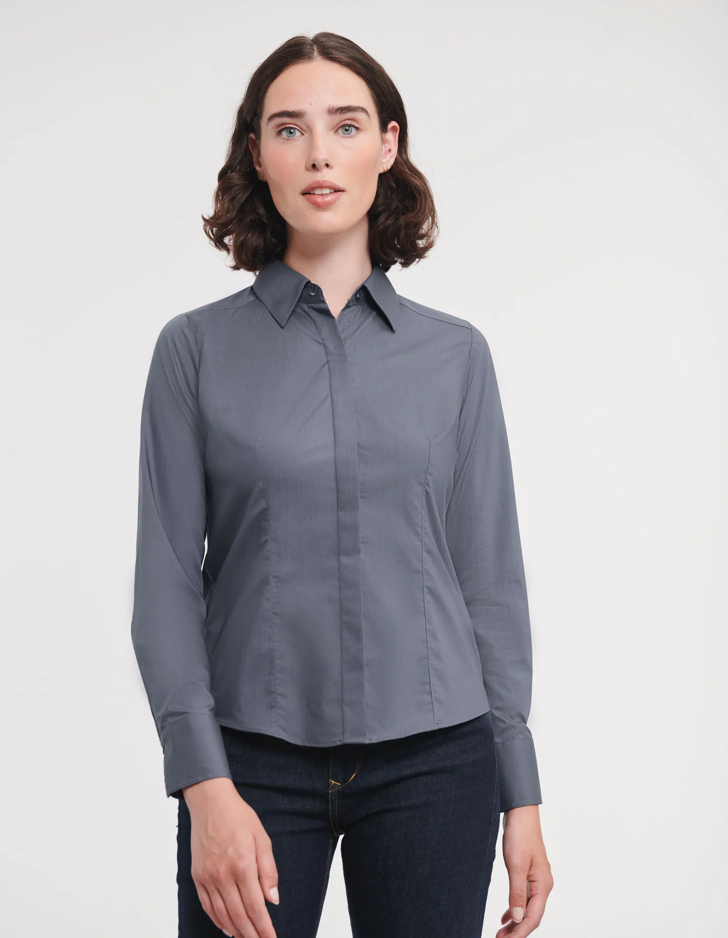 russell-r924f-ladies-ls-poly-cotton-easy-care-fitted-poplin-shirt-convoygrey-model-1 Russell Ladies Long Sleeve Polycotton Easy Care Fitted Poplin Shirt