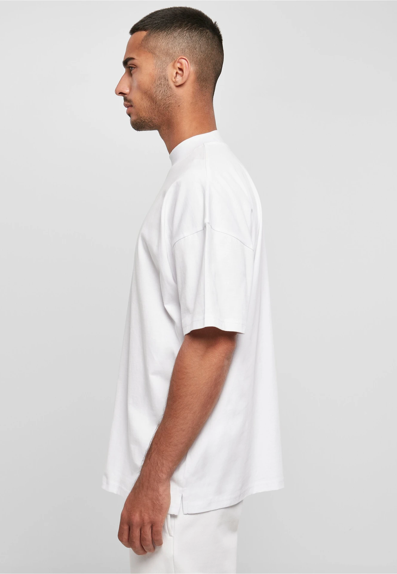 BYB-BY230-mens-oversized-mock-neck-t-shirt-white-model-1 Build Your Brand Oversized Mock Neck Tee