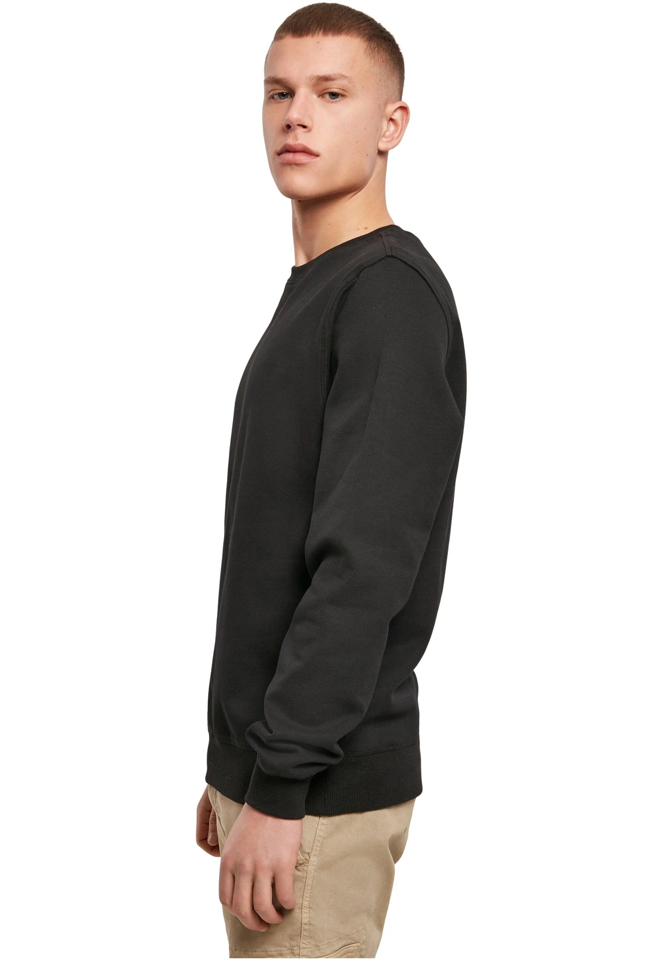 BYB-BY119-premium-crewneck-sweatshirt-black-model-1 Build Your Brand Premium Crewneck Sweatshirt