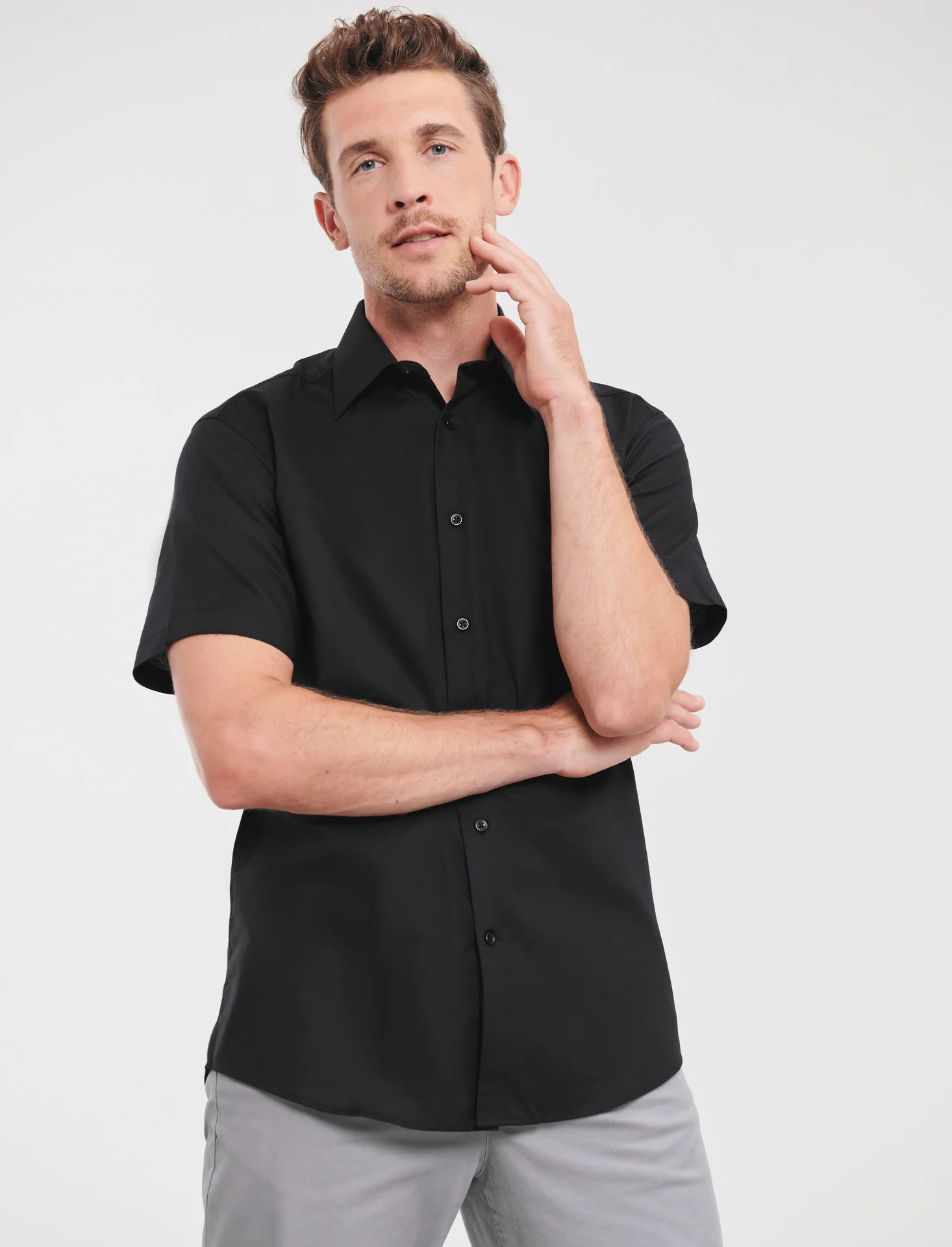 russell-r923m-mens-short-sleeve-easy-care-tailored-oxford-shirt-black-model-1 Russell Men's Short Sleeve Easy Care Tailored Oxford Shirt