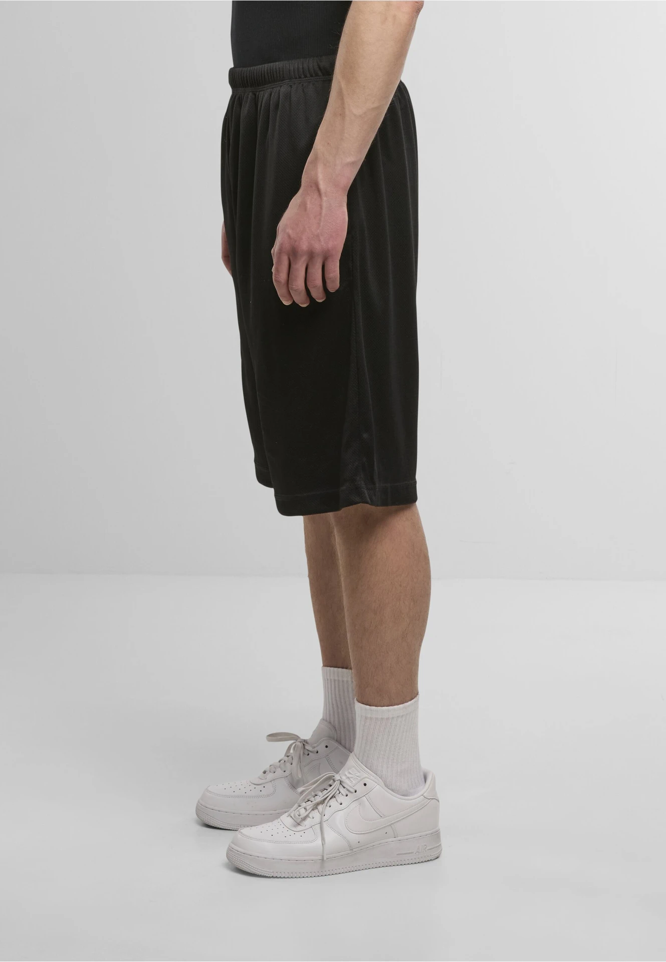 BYB-BY048-mesh-shorts-black-model-1 Build Your Brand Mesh Shorts