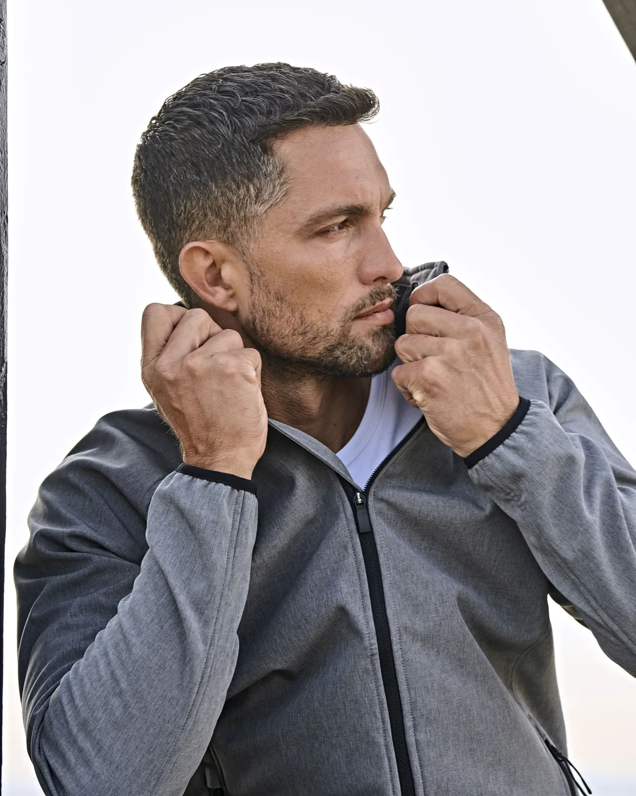 tee-jays-9510-mens-lightweight-performance-softshell-jacket-greymelange-model-0 Tee Jays Leightweight Performance Softshell
