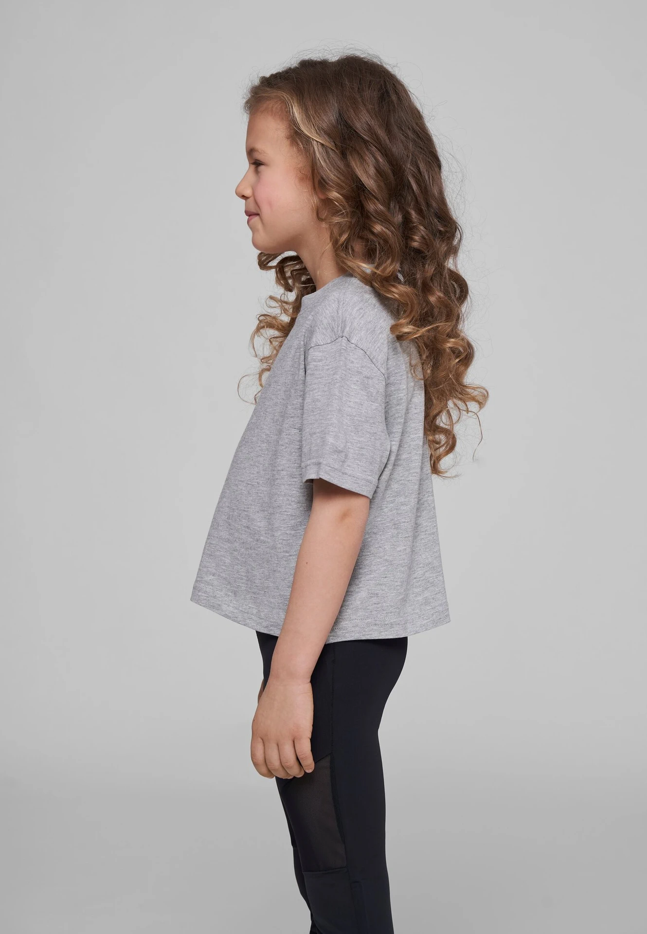 BYB-BY114-girls-cropped-jersey-t-shirt-heathergrey-model-1 Build Your Brand Girls Cropped Jersey Tee
