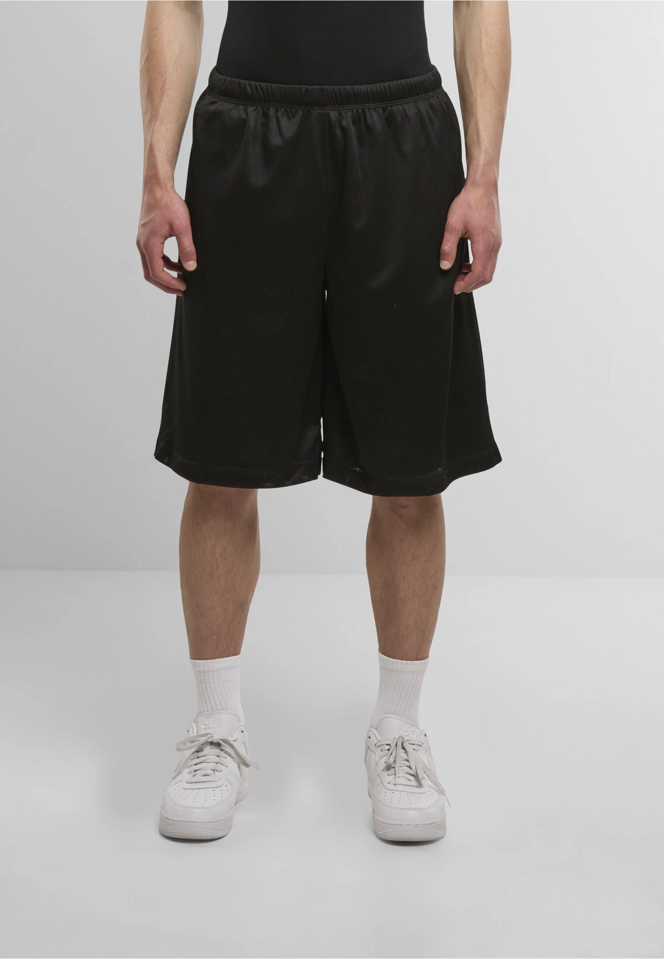 BYB-BY048-mesh-shorts-black-model-0 Build Your Brand Mesh Shorts