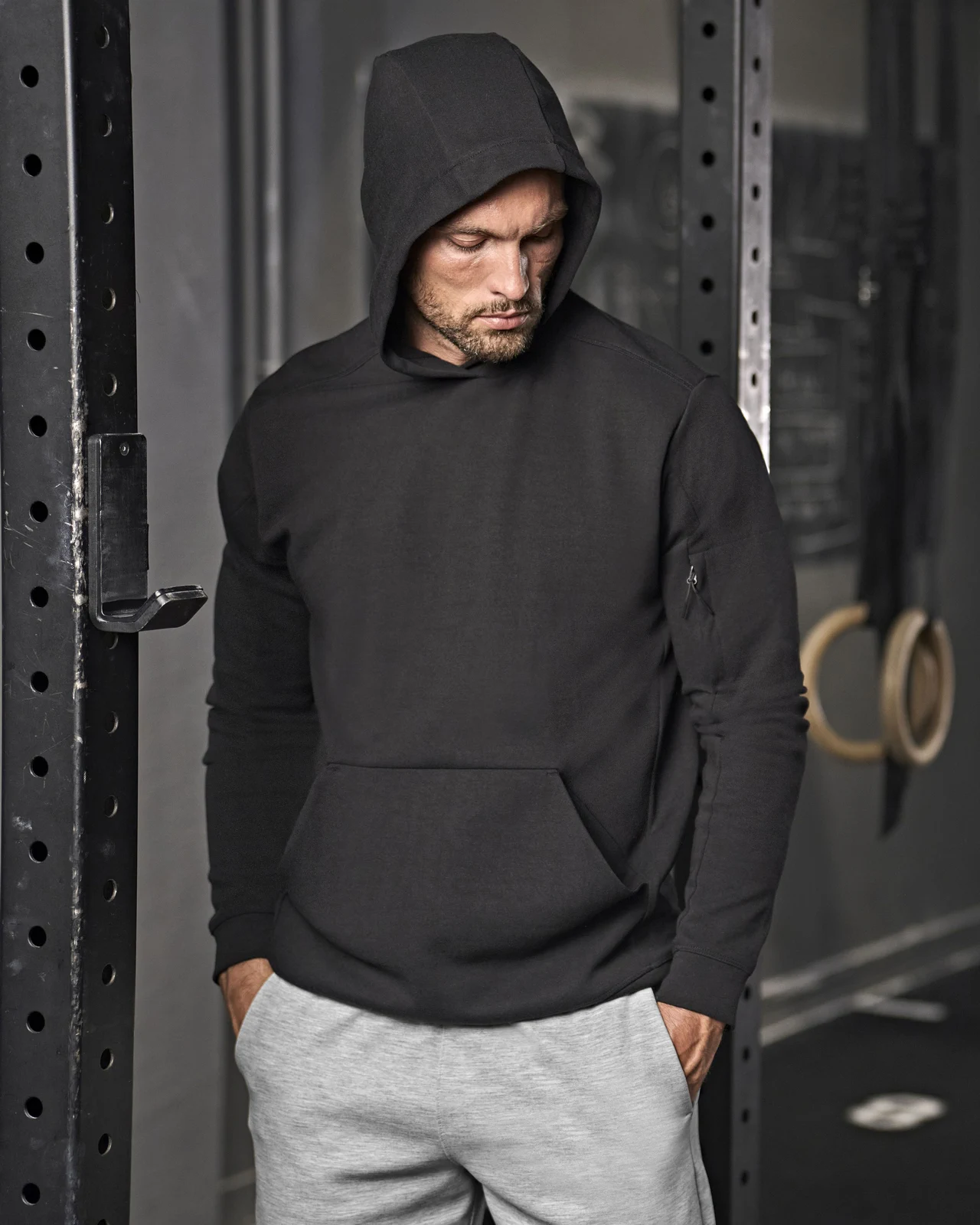 tee-jays-5702-athletic-hooded-sweatshirt-black-model-0 Tee Jays Athletic Hooded Sweat