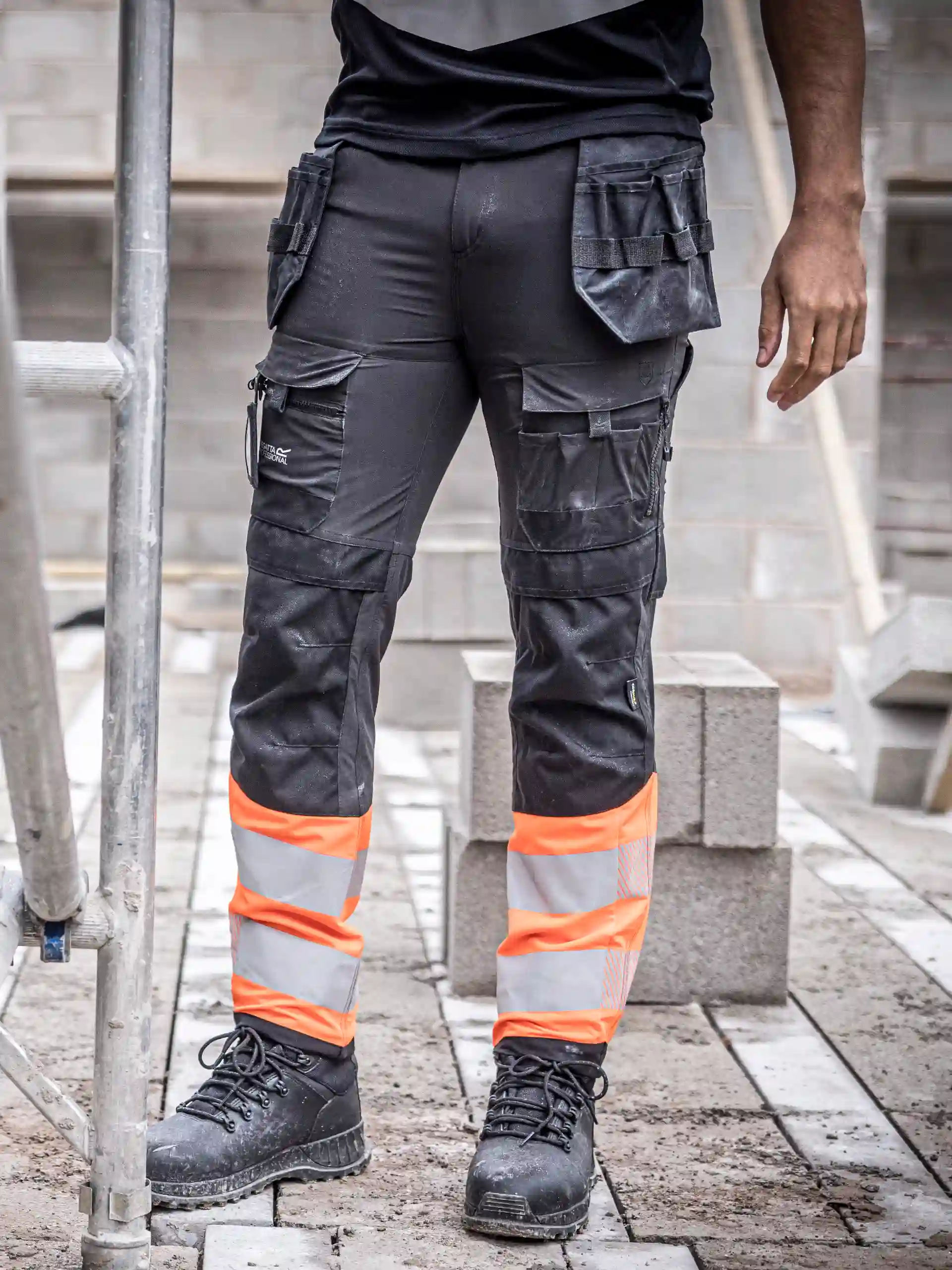 regatta-trj480-hi-vis-x-pro-stretch-holster-trouser-class1-black-signalorange-model-1 Regatta Hi-Vis X-Pro Stretch Holster Trouser